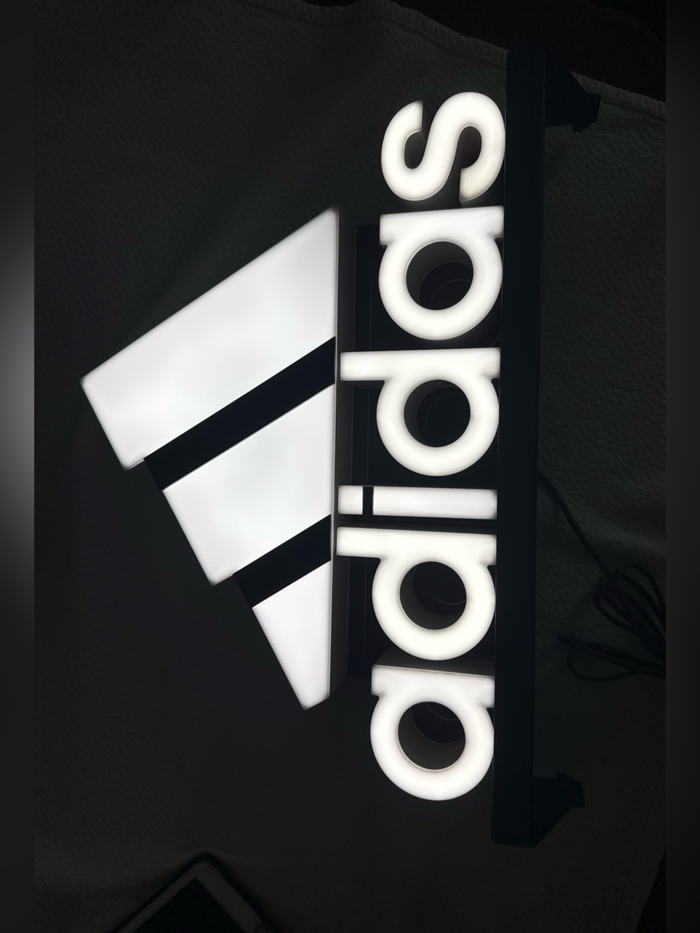 Adidas logo sign close-up